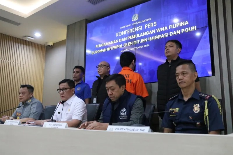 Immigration and Police Hand Over Interpol Fugitive to Philippine Authorities After Capture at Bali Airport